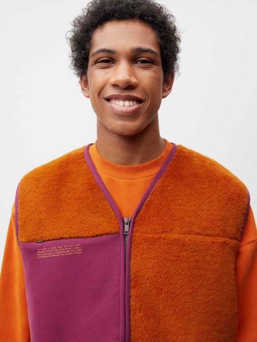 mujer chaleco polar de lana reciclada Pangaia naranja canela ropa TDTH457