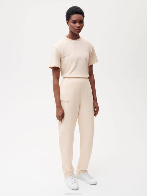 mujer pantalones de chándal tapered de algodón reciclado Pangaia arena ropa TDTH361