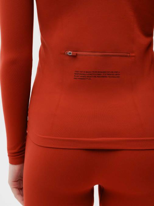mujer top de manga larga con cremallera de motion x Pangaia rojo jaspe ropa TDTH146