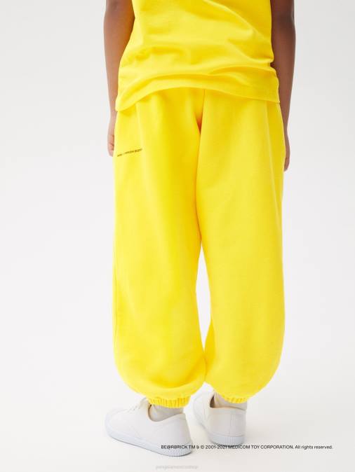 niños pantalones de chándal be@rbrick x haroshi Pangaia amarillo azafran ropa TDTH645